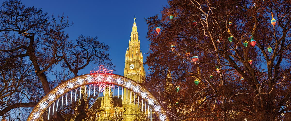 Vienna's Town Hall illuminated by Christmas decorations at night